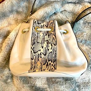 Bloomingdale’s Cross body in light gray blue with animal print. Excellent cond.